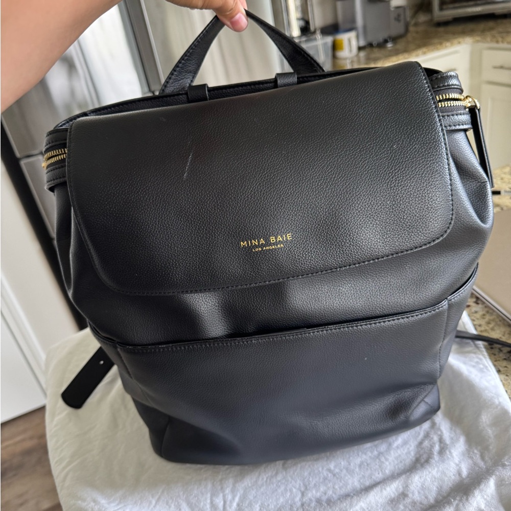 Black Backpack with Minimalist Design and Adjustable Straps